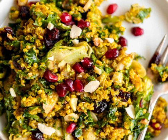 Kale & Brussels Sprouts Curry Quinoa Salad with pomegranate and almonds.