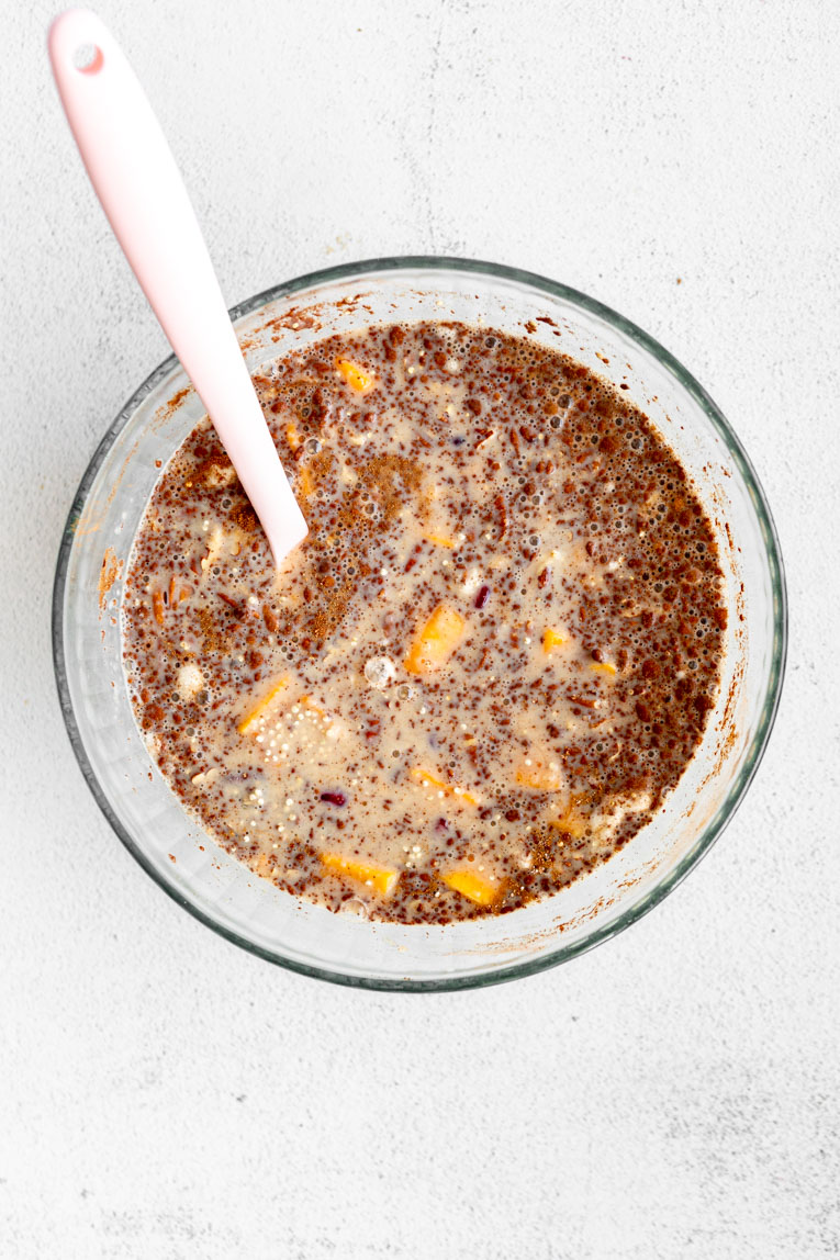 Batter for quinoa breakfast bake in a mixing bowl.