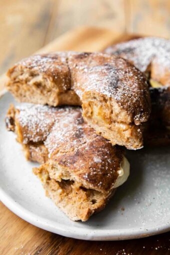 Angled photo of Cinnamon Raisin Bagel French Toast Sandwiches.