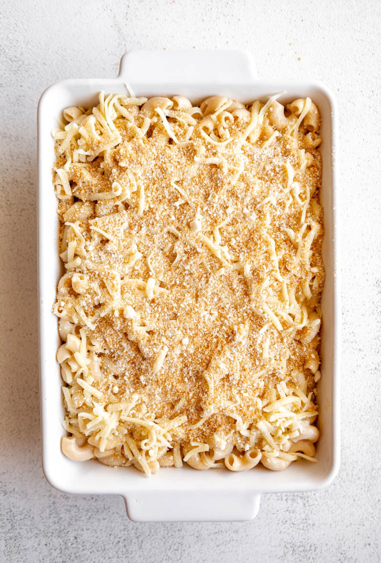Gluten-free mac & cheese in a casserole dish with breadcrumb topping.