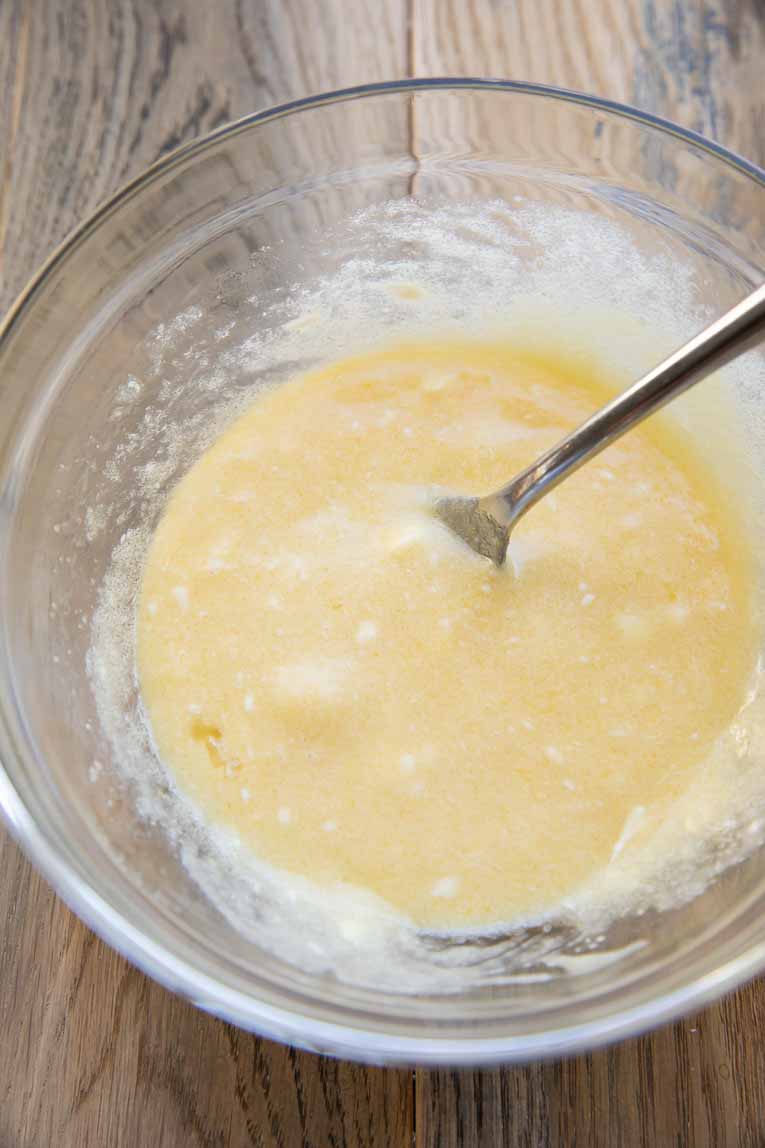 Wet ingredients for gluten-free sugar cookie dough in a bowl.