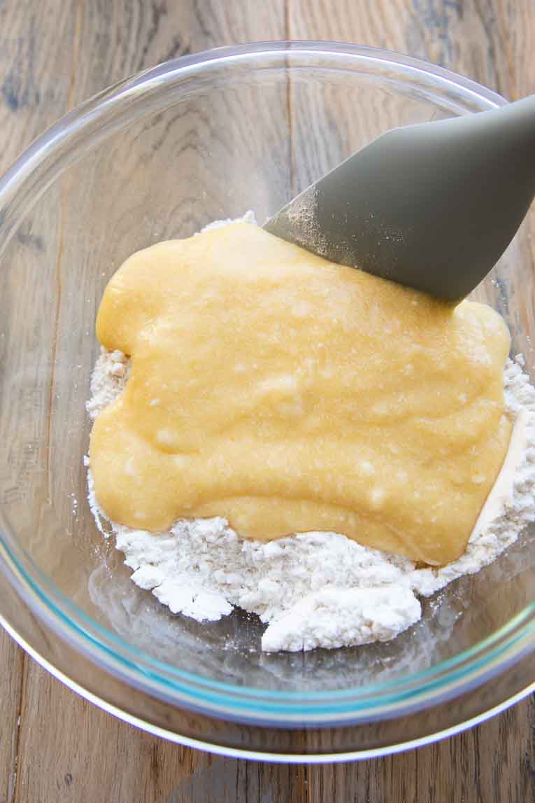 Dry ingredients mixed into liquid ingredients for gluten free cookie dough.