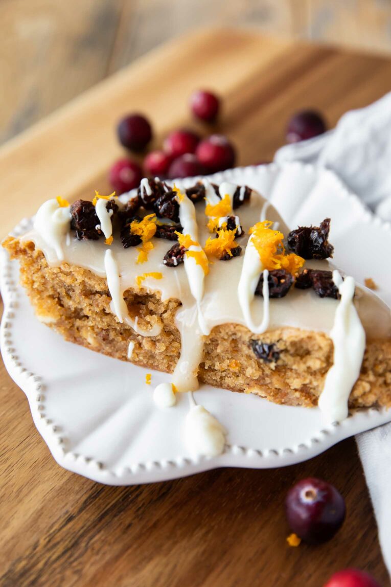 Gluten-Free Cranberry Bliss Bars recipe on a plate.