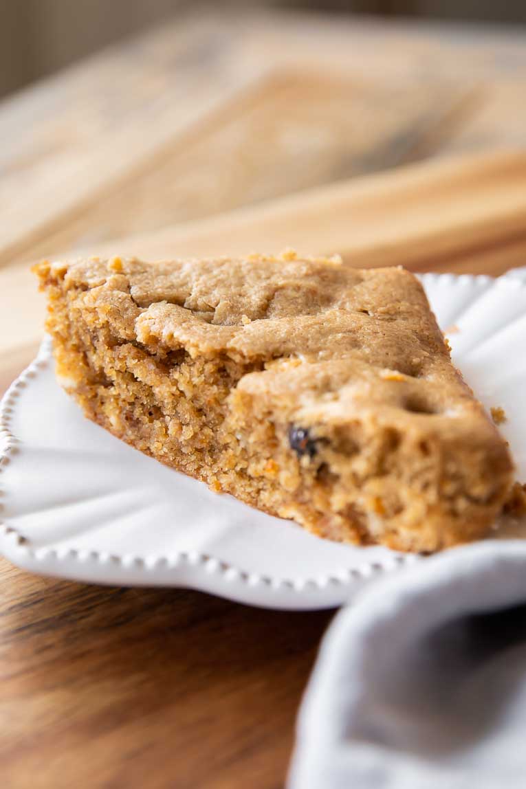 Gluten-Free Cranberry Bliss Bars without topping on a plate.