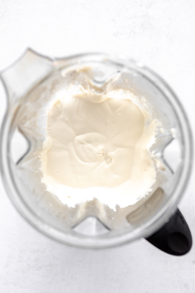Cream cheese and yogurt ingredients blended together.