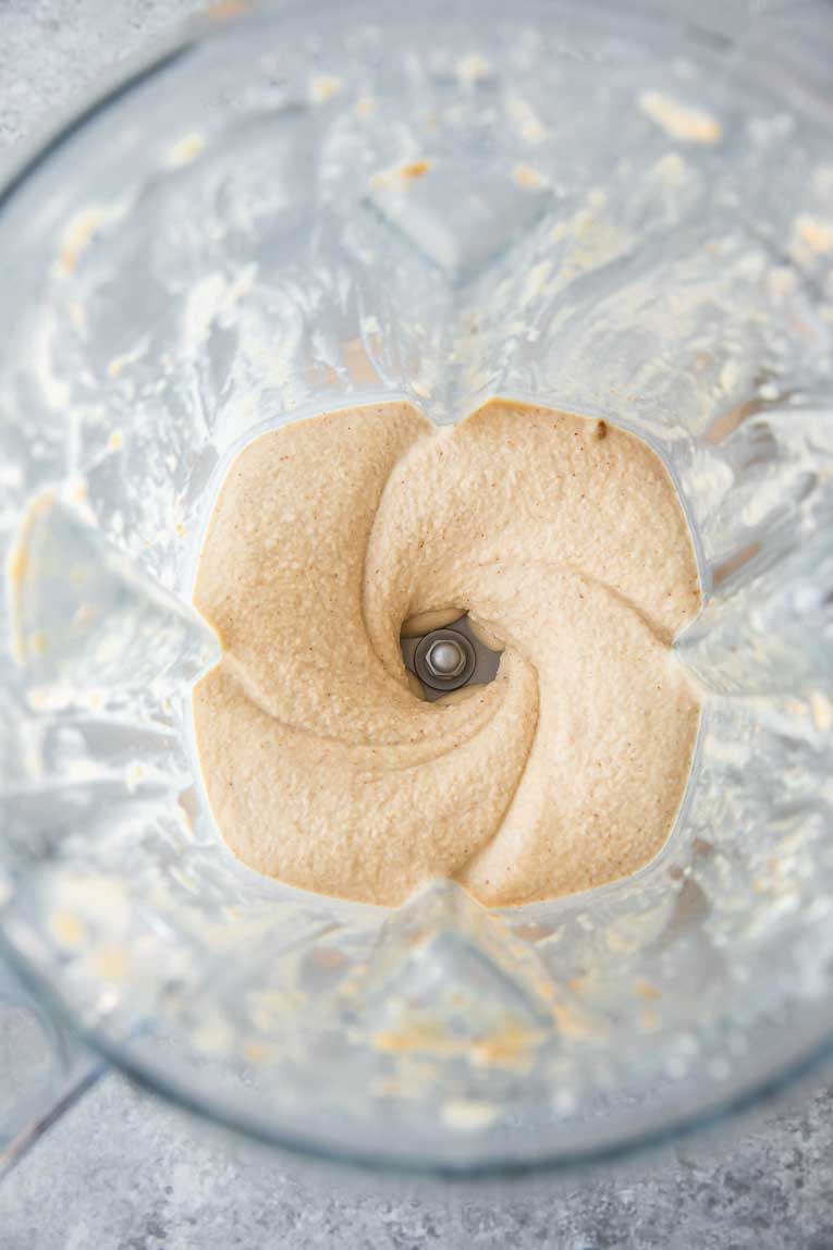 Thick, blended frosty in a blender.