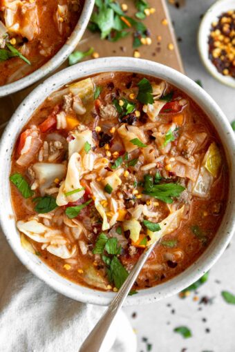 Stuffed Cabbage Soup recipe in a bowl with a spoon.