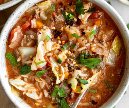 Stuffed Cabbage Soup recipe in a bowl with a spoon.