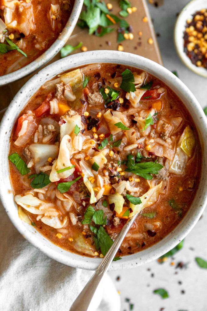 Stuffed Cabbage Soup recipe in a bowl with a spoon.