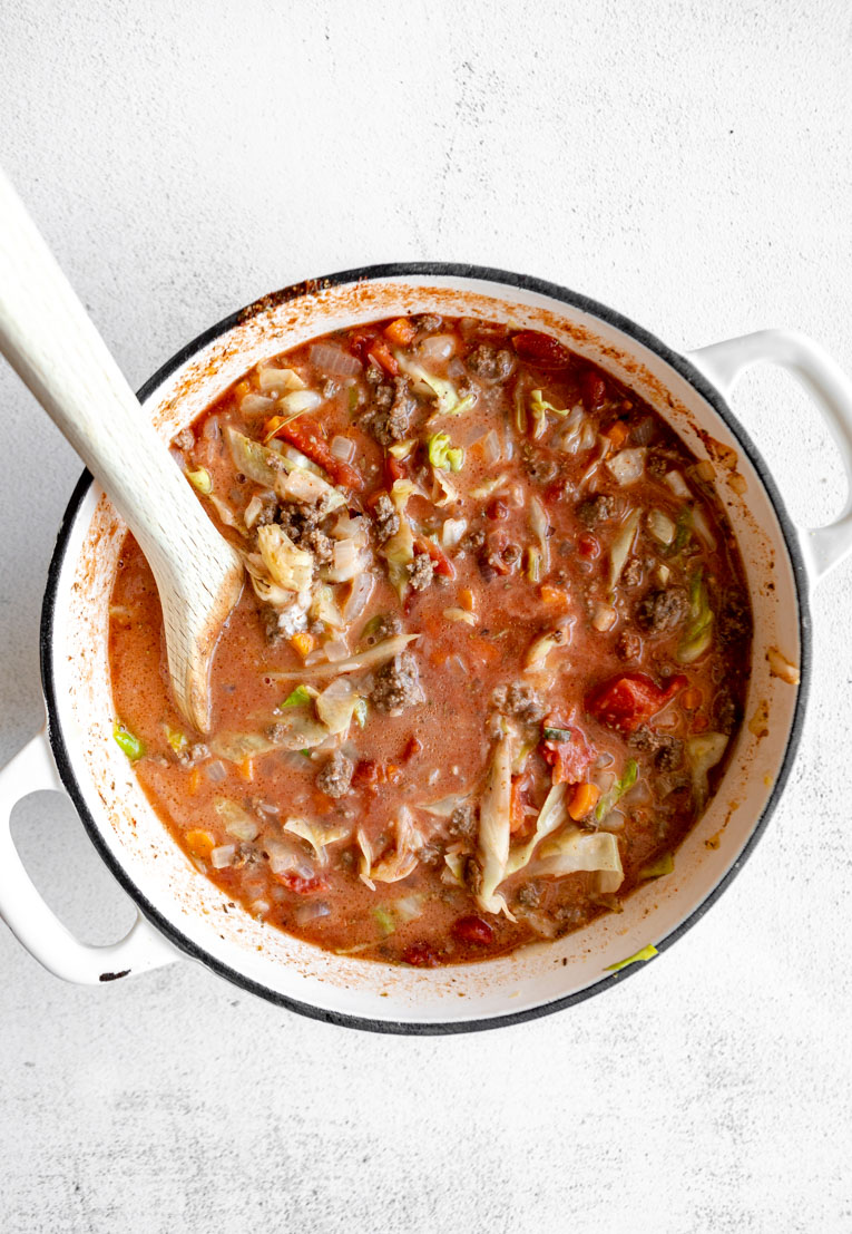 Stuffed Cabbage Soup simmering in a dutch oven.