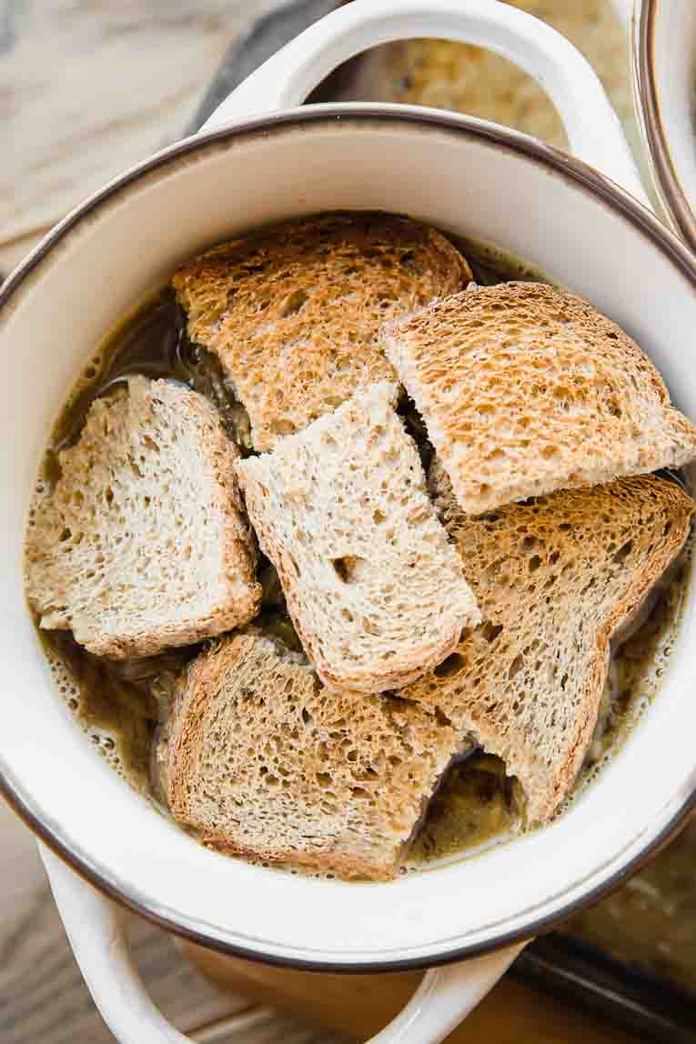 Vegetarian French Onion Soup topped with low-carb bread.