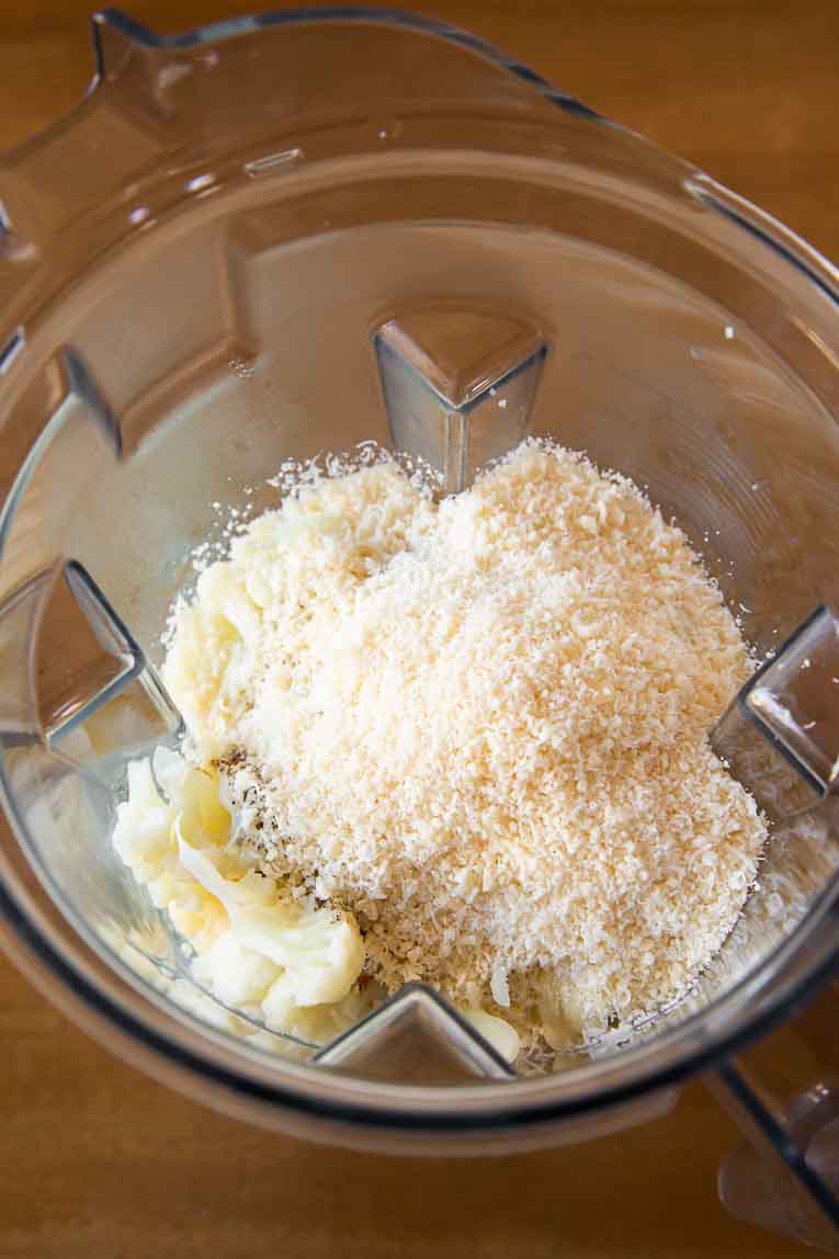 Ingredients for cauliflower mash in a blender.