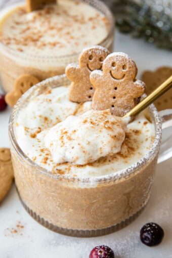 Spoonful of Gingerbread Cookie Overnight Oats being scooped out.
