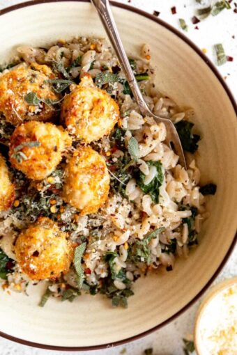Top shot of Turkey Sage Meatballs recipe over orzo.