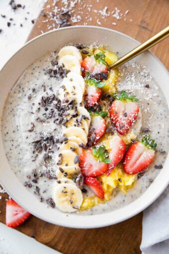 Banana Split Smoothie Bowl with strawberries, cacao, bananas.