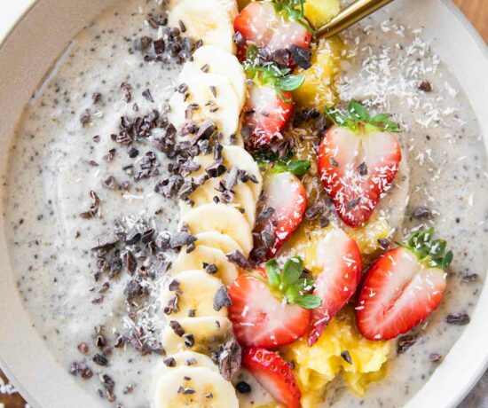 Banana Split Smoothie Bowl with strawberries, cacao, bananas.