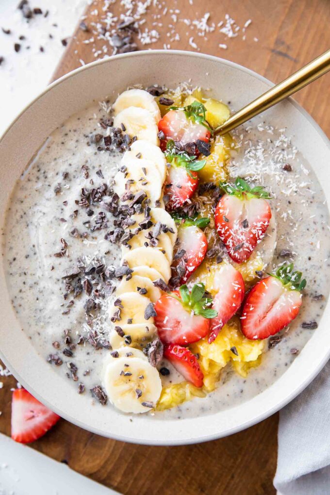 Banana Split Smoothie Bowl with strawberries, cacao, bananas.