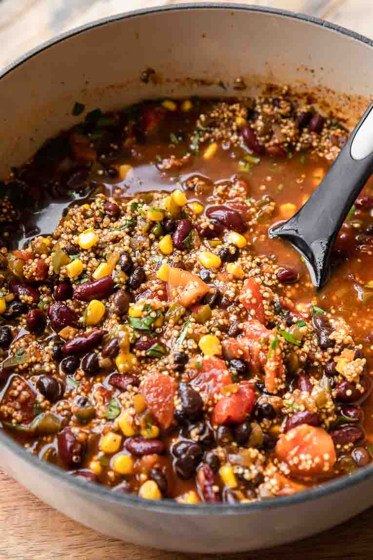 Cooked quinoa vegetarian chili in a dutch oven.