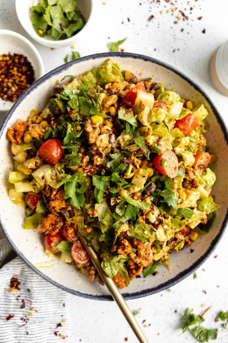 Top shot photo of Ground Turkey Taco Salad recipe in a bowl with a fork.