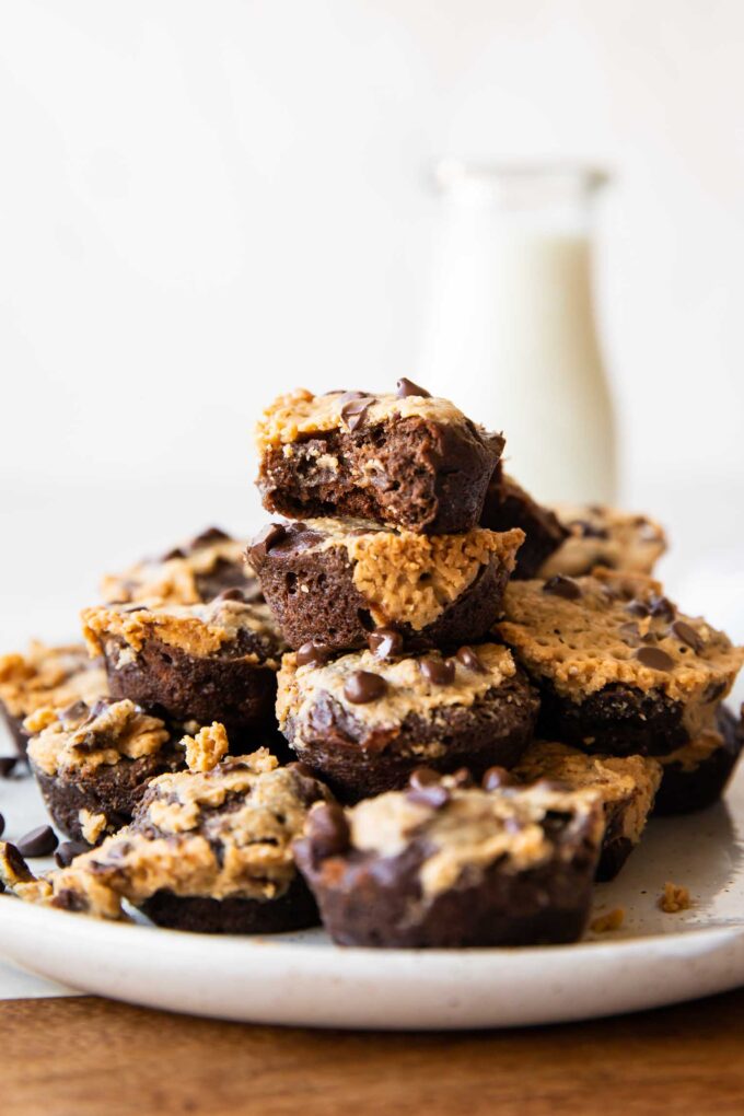 Protein Brownie Bites recipe across photo stacked on plate.