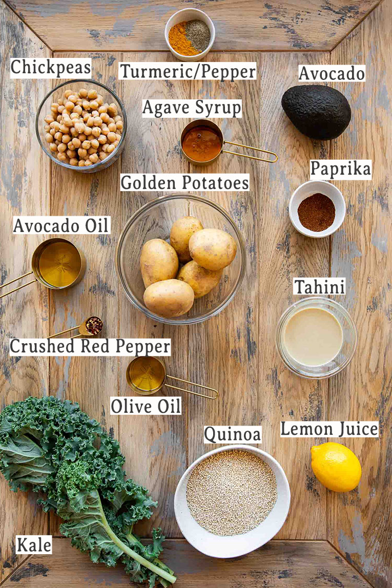 Ingredients on a wood board for Vegan Turmeric Quinoa Power Bowls recipe.