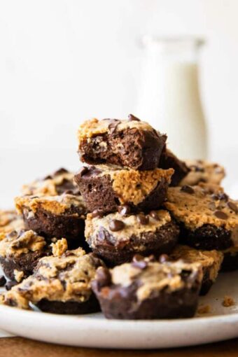 Protein Brownie Bites recipe across photo stacked on plate.