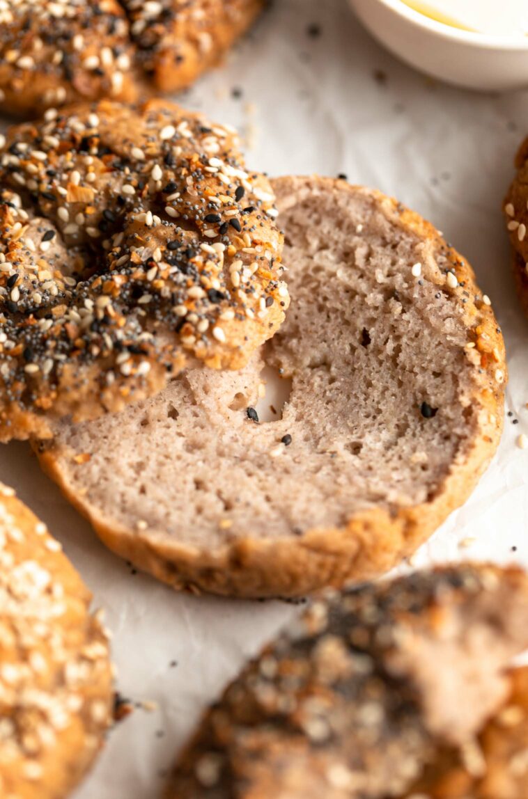 Close up of gluten-free bagel sliced in half.