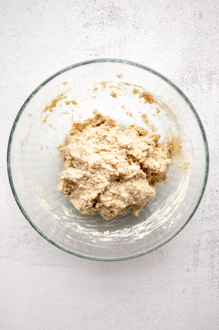 Gluten free bagel dough in a bowl.