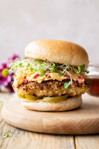 Across photo of a healthy Honey Pepper Pimento Chicken Sandwich recipe.