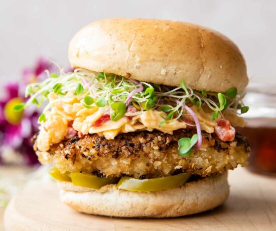 Across photo of a healthy Honey Pepper Pimento Chicken Sandwich recipe.