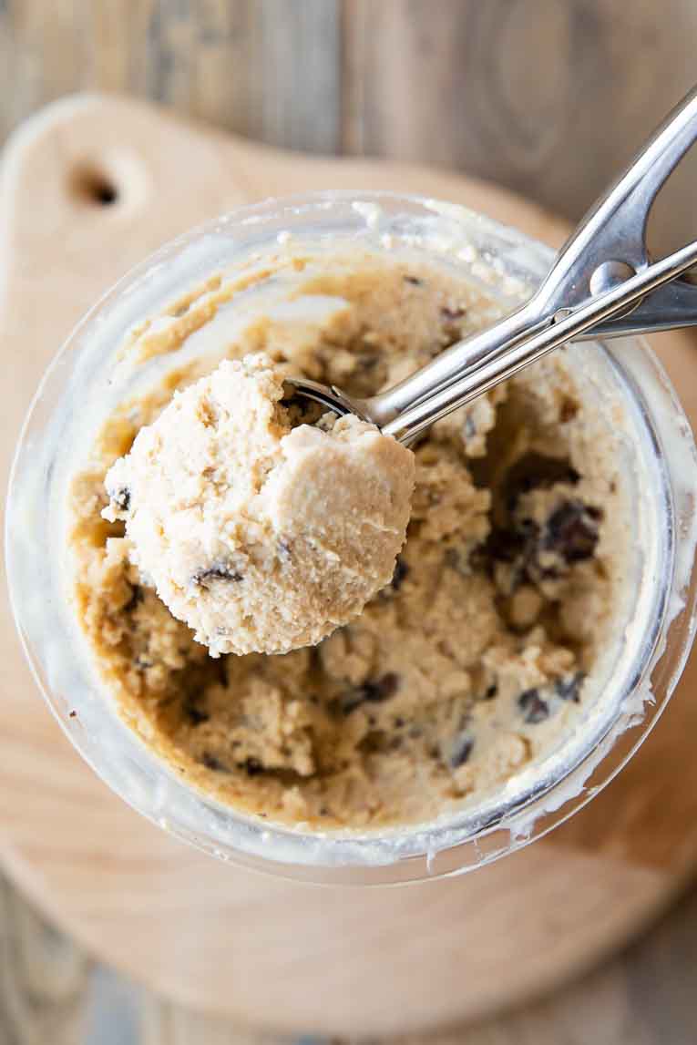 Scoop of Ninja Creami Snickers Protein Ice Cream from pint jar.