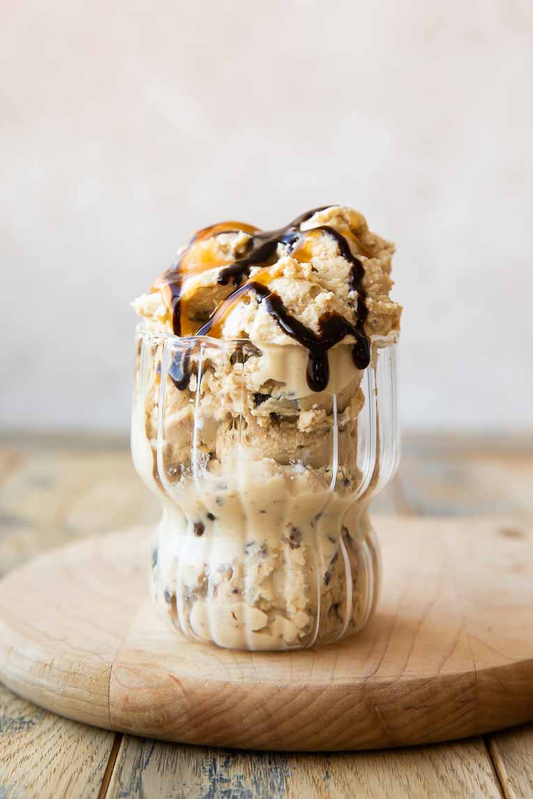 Caramel and chocolate drizzled over protein ice cream.