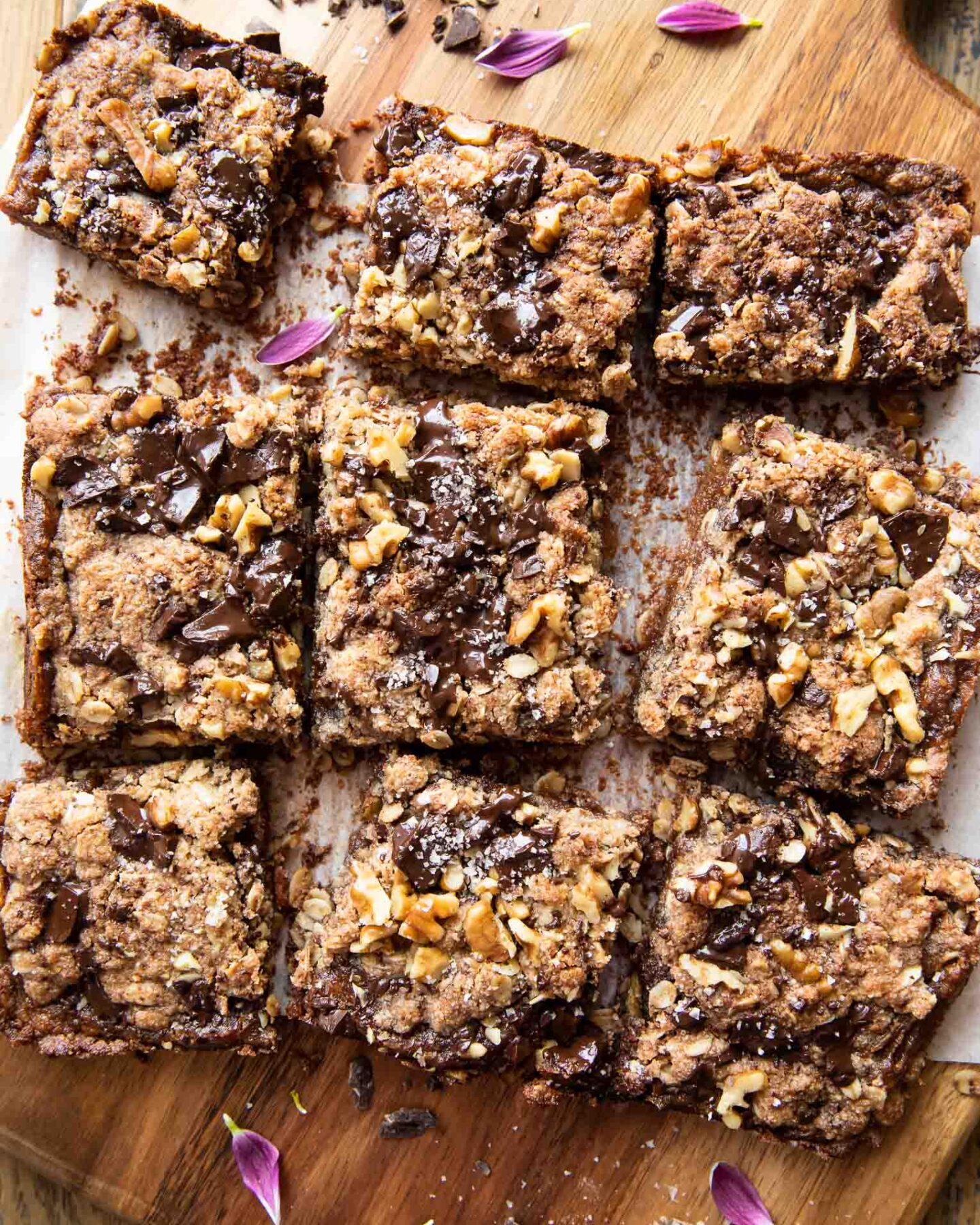 Oatmeal Chocolate Chip Date Bars sliced on a cutting board.