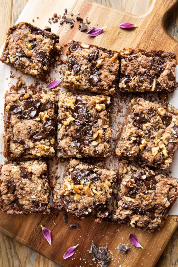 Oatmeal Chocolate Chip Date Bars sliced on a cutting board.