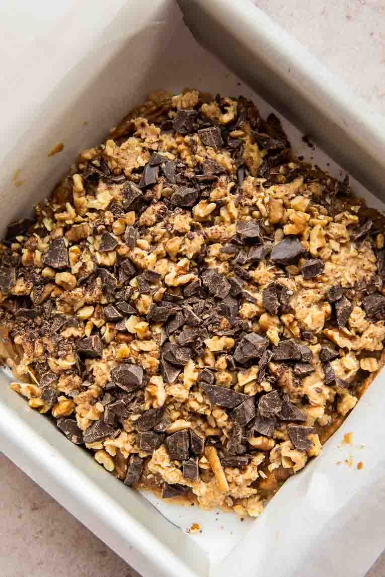 Chopped walnuts and chocolate chips pressed into bars.