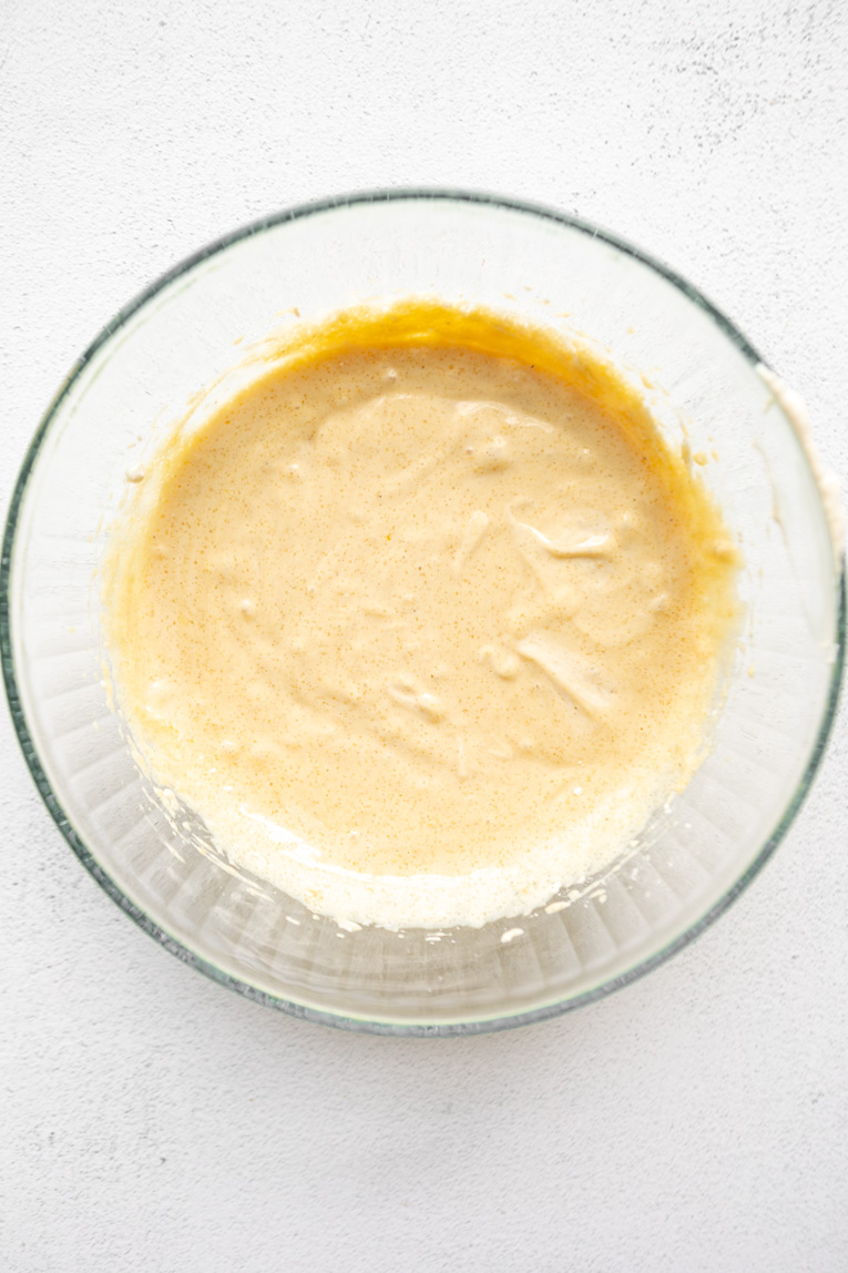 Protein cheesecake filling in a mixing bowl.