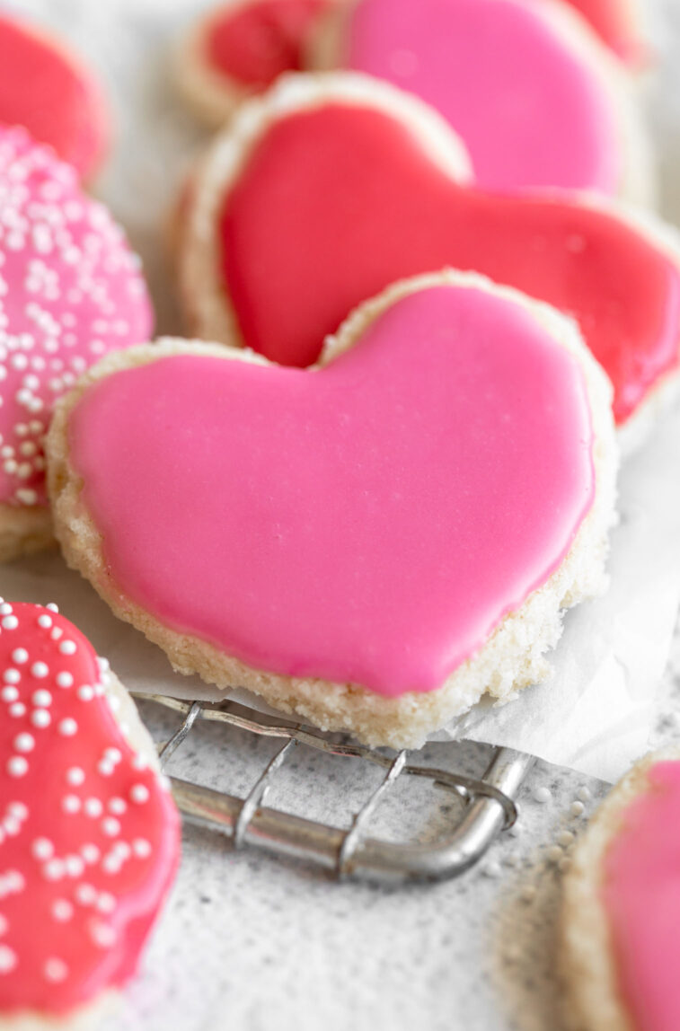 Close up of Gluten-Free Valentine's Day Shortbread Cookies on a cooling rack.