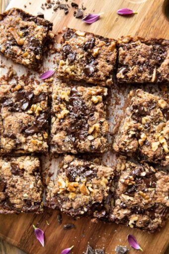 Oatmeal Chocolate Chip Date Bars sliced on a cutting board.