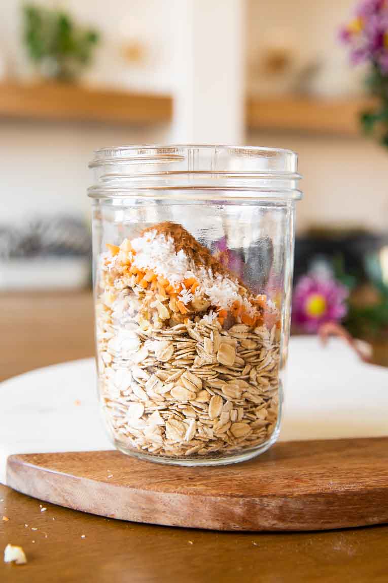 Dry ingredients for carrot cake oats in a mason jar.