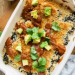 Chile Relleno Casserole with sauce and avocado.