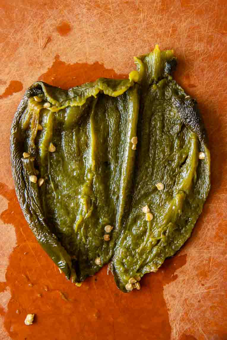 Poblano pepper cut open and seeds removed.