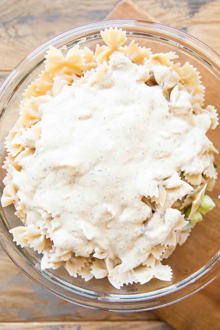 Pasta with creamy vegan mayo dressing in a bowl.