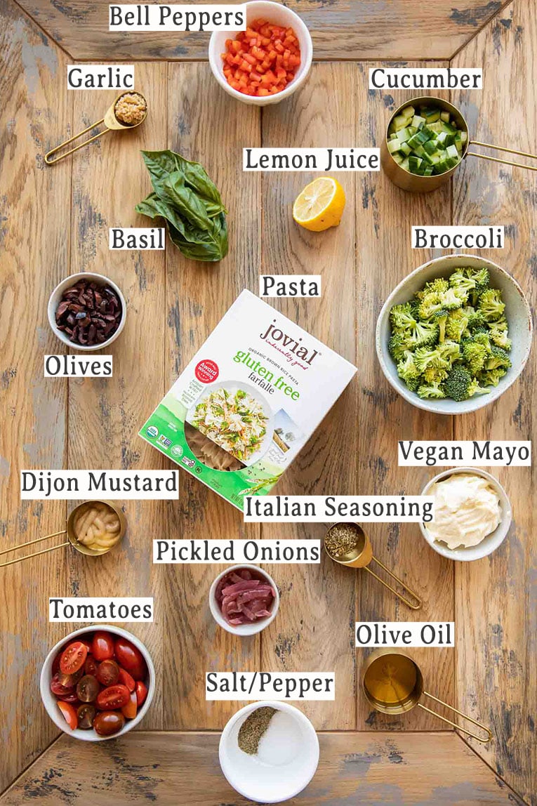 Ingredients for Creamy Vegan Pasta Salad recipe on a tabletop.