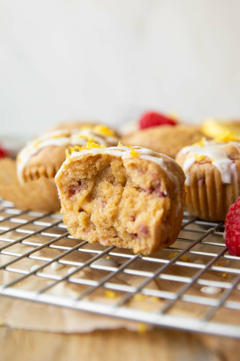 Gluten-Free Lemon Raspberry Muffin with a bite taken out.