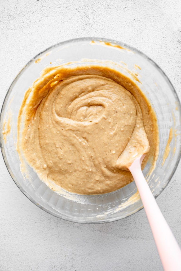 Protein banana bread batter mixed in a bowl.