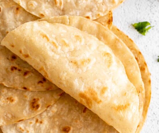 Light, soft Almond Flour Tortillas rolled up.