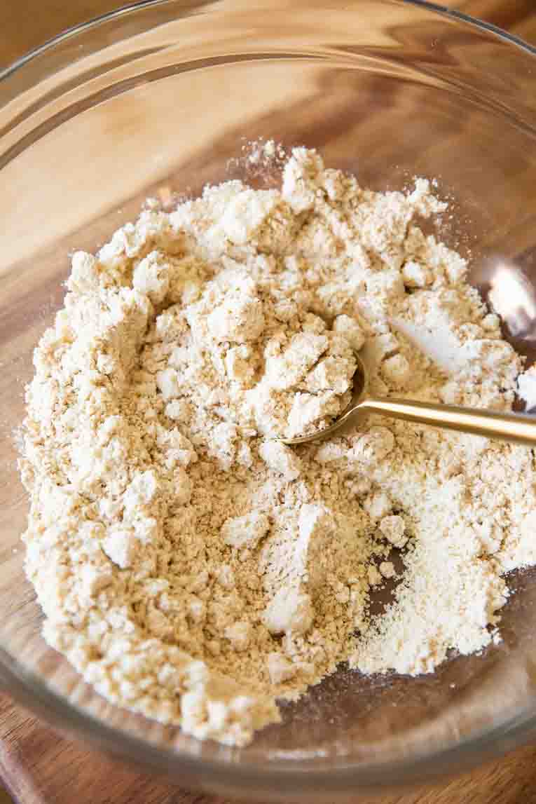 Dry ingredients for energy bites in a large mixing bowl.