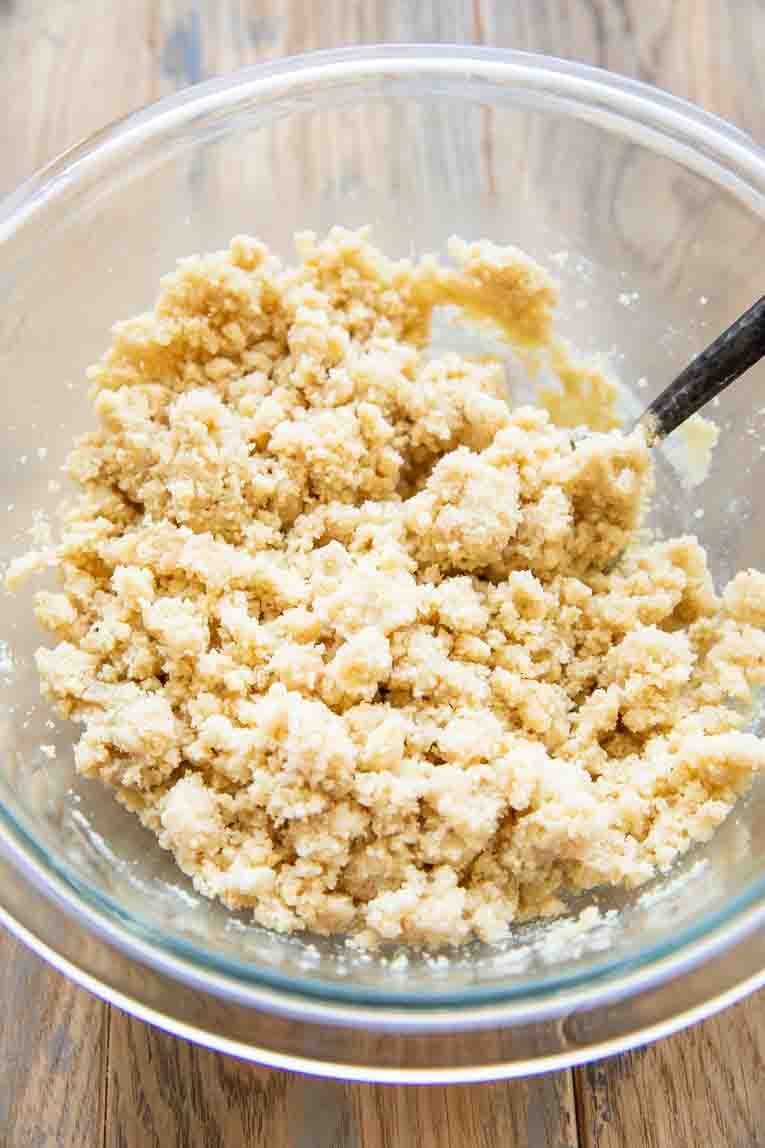 shortbread crust ingredients mixed in a bowl.