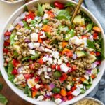 Lemon Balsamic Lentil Salad top shot photo in a bowl with ingredients around it.