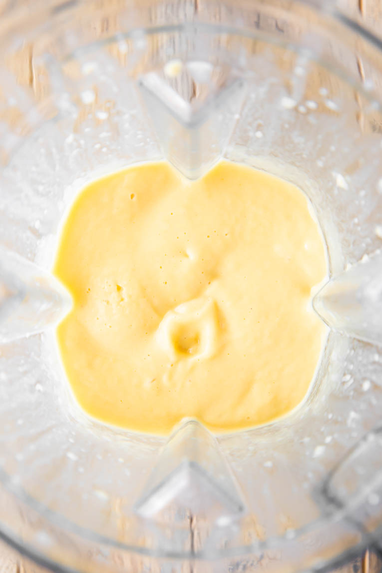 Freshly blended mango smoothie.
